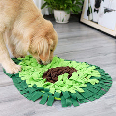 Dog sniffing out kibble in The Snuffle Mat